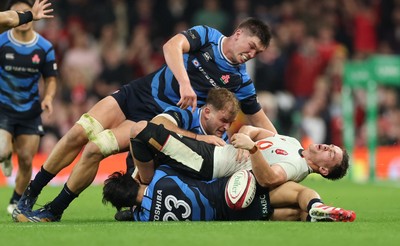 151125 - Wales v Japan, Quilter Nations Series - Alex Mann of Wales is hit by Harry Hockings of Japan