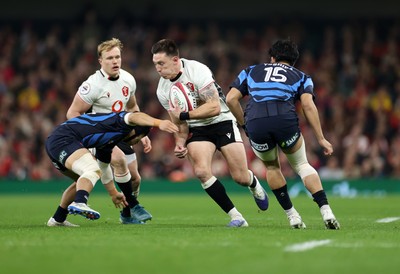 151125 - Wales v Japan - Quilter Nations Series - Josh Adams of Wales is tackled by Kippei Ishida and Yoshitaka Yazaki of Japan 