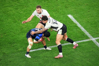 151125 - Wales v Japan - Quilter Nations Series - Kippei Ishida of Japan is tackled by Louis Rees-Zammit of Wales