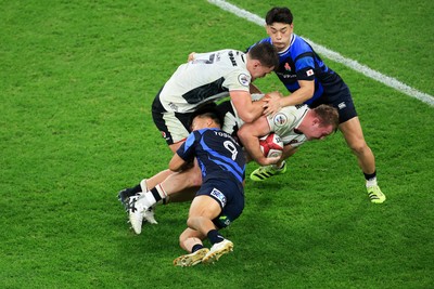 151125 - Wales v Japan - Quilter Nations Series - Dewi Lake of Wales is tackled by Kenji Sato of Japan