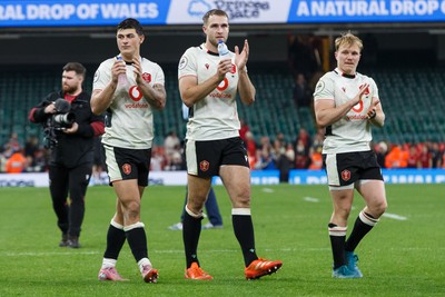 151125 - Wales v Japan - Quilter Nations Series - Louis Rees-Zammit, Max Llewellyn and Blair Murray of Wales at the end of the match