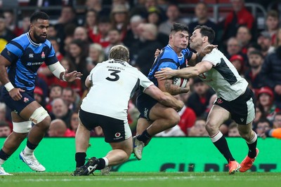 151125 - Wales v Japan - Quilter Nations Series - Charlie Lawrence of Japan is tackled by Archie Griffin and Tomos Williams of Wales