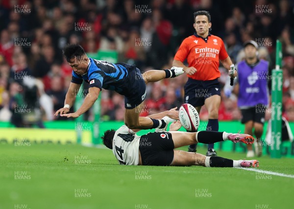 151125 - Wales v Japan, Quilter Nations Series - Tomoki Osada of Japan is upended by Louis Rees-Zammit of Wales