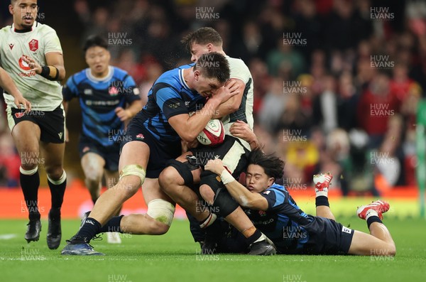 151125 - Wales v Japan, Quilter Nations Series - Alex Mann of Wales is hit by Harry Hockings of Japan