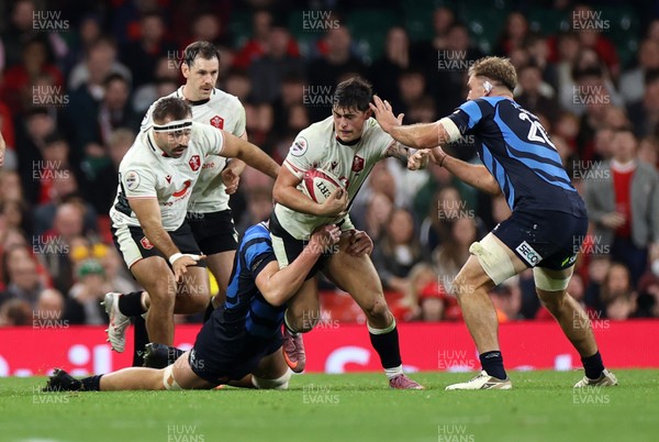 151125 - Wales v Japan - Quilter Nations Series - Louis Rees-Zammit of Wales is tackled by Tyler Paul of Japan 