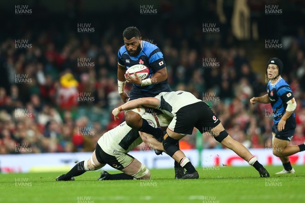 151125 - Wales v Japan - Quilter Nations Series - Faulua Makisi of Japan is tackled by Aaron Wainwright and Alex Mann of Wales