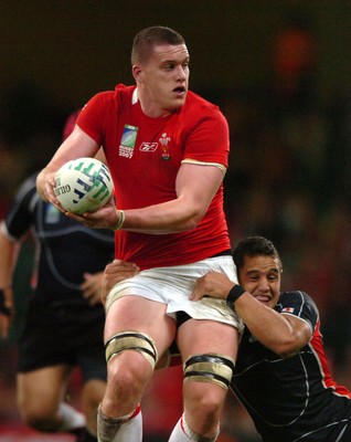 20.09.07 - Wales v Japan - Rugby World Cup 2007 - Wales' Ian Evans is tackled by Bryce Robins 