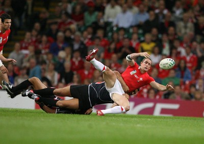 20.09.07 Wales v Japan RWC2007 Wales' Shane Williams is tackled by Japan's Shotaro Onishi  
