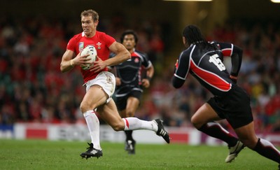 20.09.07 Wales v Japan RWC2007 Wales' Dafydd James runs around Japan's Christian Loamanu  