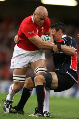 20.09.07 Wales v Japan RWC2007 Wales'  Will James is tackled by Japan's Luke Thompson  