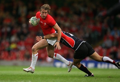 20.09.07 Wales v Japan RWC2007 Wales'  Jamie Robinson is tackled by Japan's Bryce Robins  