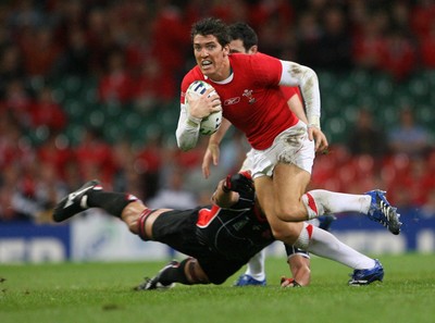20.09.07 Wales v Japan RWC2007 Wales'  James Hook is tackled by Japan's Hitoshi Ono  