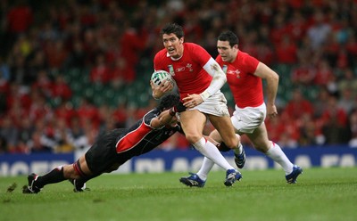 20.09.07 Wales v Japan RWC2007 Wales'  James Hook is tackled by Japan's Hitoshi Ono  