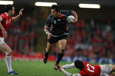 20.09.07 Wales v Japan RWC2007 Wales'  James Hook tries to stop Japan's Kosuke Endo 