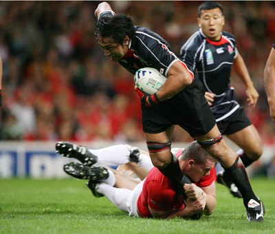 20.09.07 Wales v Japan RWC2007 Japan's Hitoshi Ono powers through as Gethin Jenkins tackles. 
