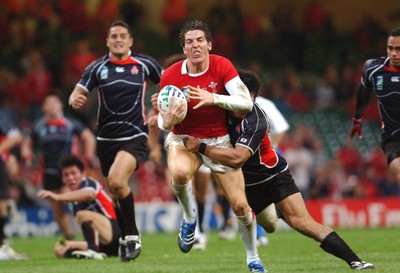 20.09.07 - Wales v Japan RWC 2007 Wales' James Hook is brought down 