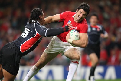 20.09.07 - Wales v Japan, RWC 2007 -  Wales' Michael Phillips beats Japan's Christian Loamanu to score try 