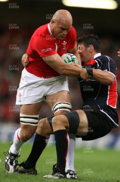 20.09.07 Wales v Japan RWC2007 Wales'  Will James is tackled by Japan's Luke Thompson  