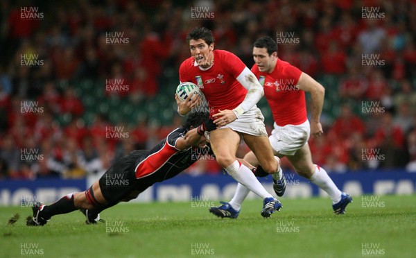 20.09.07 Wales v Japan RWC2007 Wales'  James Hook is tackled by Japan's Hitoshi Ono  