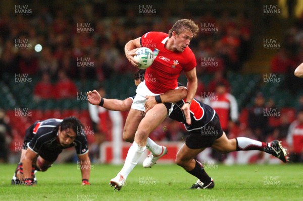 20.09.07 - Wales v Japan RWC 2007 Wales' Jamie Robinson tries to get through 