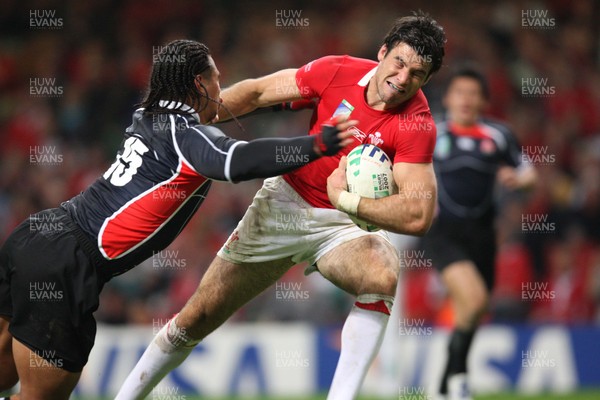 20.09.07 - Wales v Japan, RWC 2007 -  Wales' Michael Phillips beats Japan's Christian Loamanu to score try 
