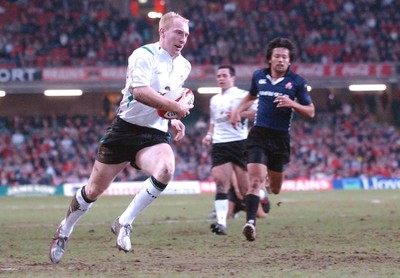 26-11-04. Wales v Japan  Wales' Tom Shanklin goes through unaposed to score try.  