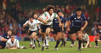 26.11.04  Wales v Japan, Cardiff  Wales Colin Charvis sets off for his fourth try.  