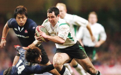 26-11-04. Wales v Japan  Wales' Gareth Cooper gets away from Koichiro Kubota to score try.  