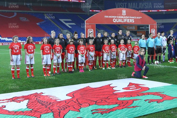 241117 Wales v Kazakhstan - FIFA Women's World Cup Qualifier -   Players of Wales line up for the Anthems