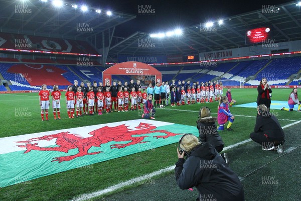 241117 Wales v Kazakhstan - FIFA Women's World Cup Qualifier -   Players of Wales and Kazakhstan line up for the Anthems