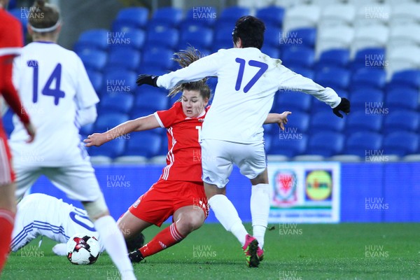 241117 Wales v Kazakhstan - FIFA Women's World Cup Qualifier -   Alice Griffiths of Wales shoots under pressure from Karina Zhumabaikyzy of Kazakhstan