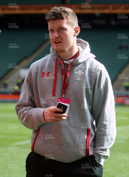 110513 - Wales v Kenya - IRB Sevens England - Ifan Evans of Wales relaxes before the match 