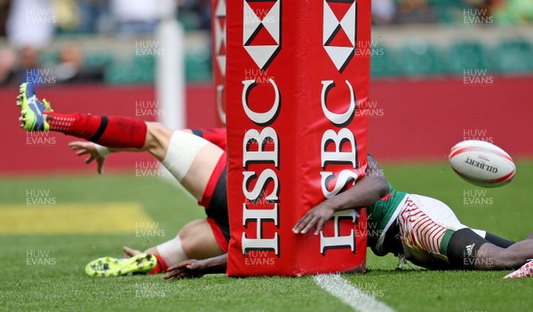 200617  - Wales vs Kenya - HSBC World Rugby Sevens Series - Lloyd Evans of Wales has the ball knocked out of his hands as he is about to score a try  