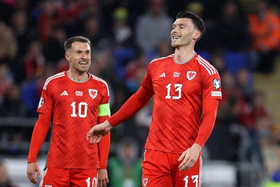 280323 - Wales v Latvia - European Championship Qualifier - Group D - Aaron Ramsey and Kieffer Moore of Wales 