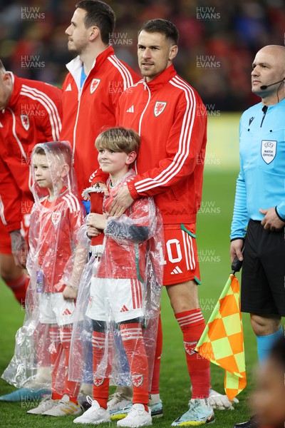280323 - Wales v Latvia - European Championship Qualifier - Group D - Aaron Ramsey of Wales with his son