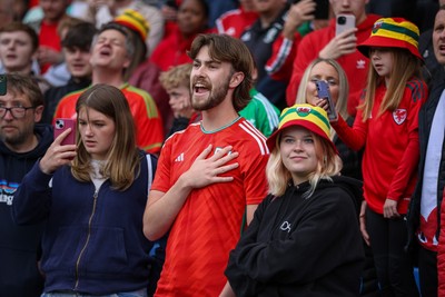 060625 - Wales v Liechtenstein - 2026 FIFA World Cup Qualifying - Wales fan during National Anthem
