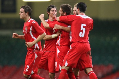 11.10.08 ... Wales v Liechtenstein, World Cup Qualifying Match Group 4, Millennium Stadium, Cardiff - Wales' Ched Evans is congratulated by teammates after he scores the second goal 