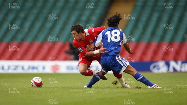 11.10.08 ... Wales v Liechtenstein, World Cup Qualifying Match Group 4, Millennium Stadium, Cardiff - Wales' Gareth Bale  takes on Liechtenstein's Michele Polverino  