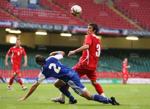 11.10.08 ... Wales v Liechtenstein, World Cup Qualifying Match Group 4, Millennium Stadium, Cardiff - Wales' Gareth Bale is challenged by Liechtenstein's Marco Ritzberger   