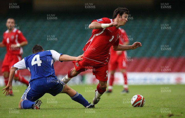 11.10.08 ... Wales v Liechtenstein, World Cup Qualifying Match Group 4, Millennium Stadium, Cardiff - Wales' Gareth Bale is brought down by Liechtenstein's Fabio D'Elia   