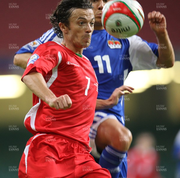 11.10.08 ... Wales v Liechtenstein, World Cup Qualifying Match Group 4, Millennium Stadium, Cardiff - Wales' Simon Davies is challenged by Liechtenstein's Franz Burgmeier   