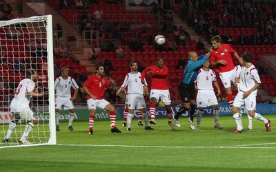 11.08.10 .. Wales v Luxembourg, .Friendly International, Llanelli -  Wales' Andy King scores Wales' third goal 