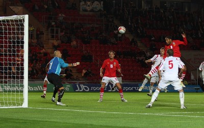 11.08.10 .. Wales v Luxembourg, .Friendly International, Llanelli -  Wales' Ashley Williams heads home to score Wales' fourth goal 