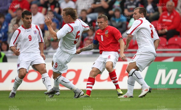 11.08.10 .. Wales v Luxembourg, .Friendly International, Llanelli -  Wales' Craig Bellemy takes on the Luxembourg defenders 