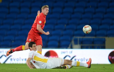 111013 - Wales v Macedonia - FIFA 2014 World Cup Qualifier - Simon Church of Wales tries a shot at goal