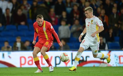 111013 - Wales v Macedonia - FIFA 2014 World Cup Qualifier - Craig Bellamy of Wales tries a shot at goal