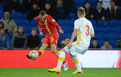 111013 - Wales v Macedonia - FIFA 2014 World Cup Qualifier - Craig Bellamy of Wales tries a shot at goal