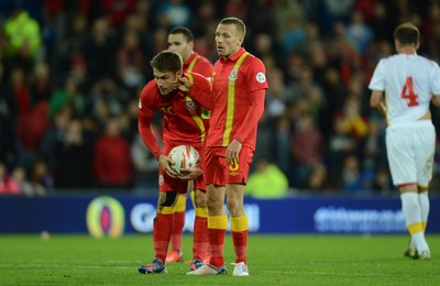 111013 - Wales v Macedonia - FIFA 2014 World Cup Qualifier - Craig Bellamy of Wales walks away as Aaron Ramsey lines-up his penalty attempt