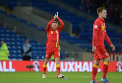 111013 - Wales v Macedonia - FIFA 2014 World Cup Qualifier - Craig Bellamy of Wales waves to the crowd at the end of the game