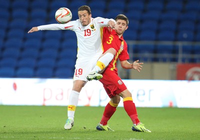 11013 - Wales v Macedonia, World Cup 2014 Qualifying - Wales' Declan John and Macedonia's Agim Ibraimi compete for the ball(c) Huw Evans Picture Agency, Cardiff